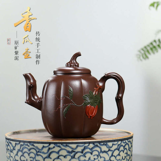 Handmade Yixing purple sand teapot with pumpkin design, showcasing traditional craftsmanship and elegant details.