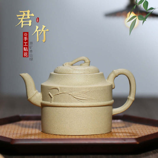 Handmade Yixing purple sand teapot featuring bamboo design, crafted from original Benshan green mud for Kung Fu tea set.