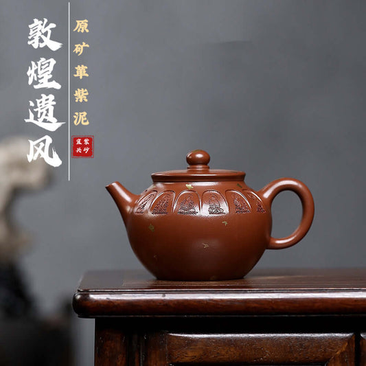 Handmade Yixing purple sand teapot with intricate design, perfect for home kung fu tea set.