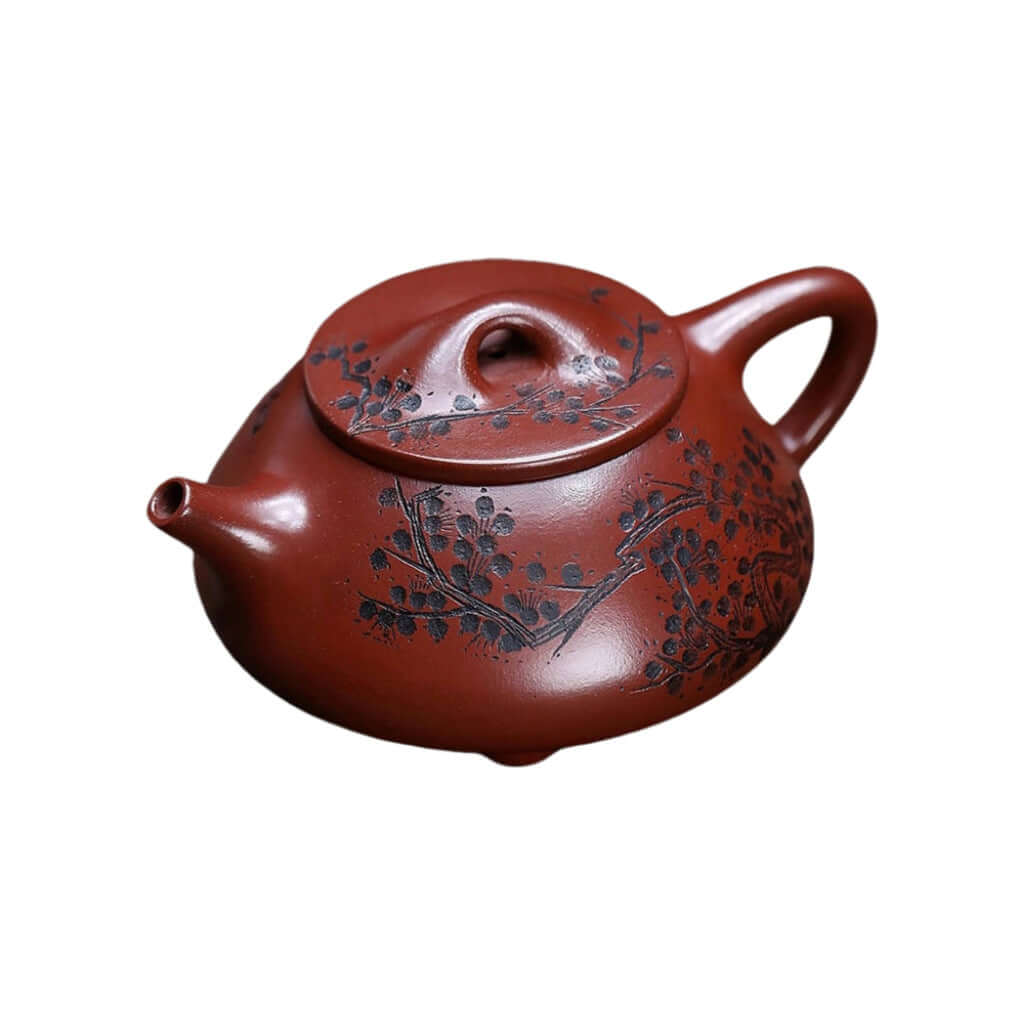 Handmade Yixing purple sand teapot with intricate design, perfect for kung fu tea. Original craft by skilled artisans.