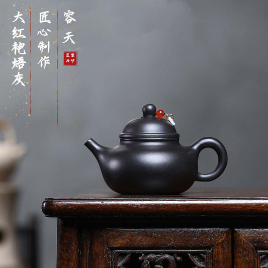 Handmade Yixing purple sand teapot with gray matte finish, ideal for Kung Fu tea set, showcasing artisanal craftsmanship.