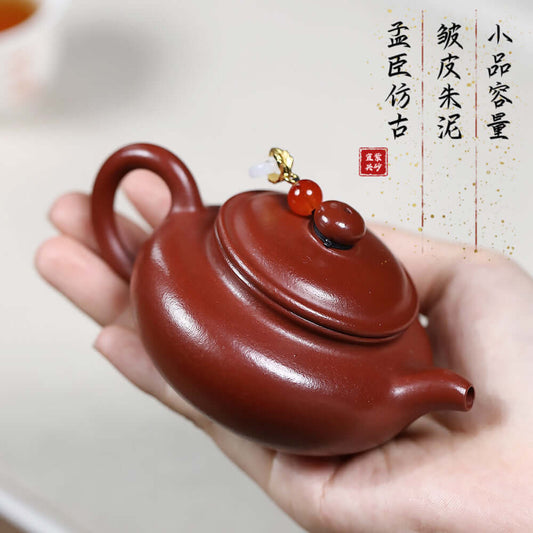 Handmade Yixing purple sand teapot with unique wrinkled skin design, perfect for brewing Kung Fu tea.