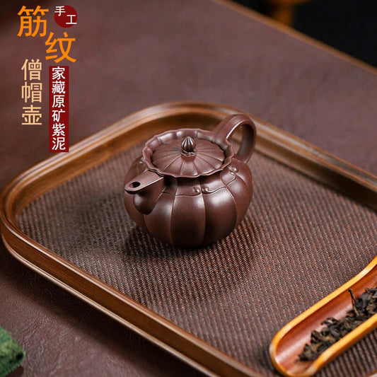 Handmade Yixing purple sand teapot with muscle pattern, featuring original purple sand, perfect for home use.