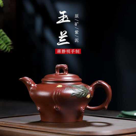 Handmade Yixing purple sand teapot featuring elegant leaf design, made from original raw purple clay.