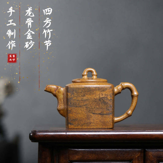 Handmade Yixing purple sand teapot with bamboo handle, ideal for kung fu tea sets and tea ceremonies.