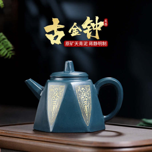 Handmade Yixing purple sand teapot in Tianqing mud, featuring a unique geometric design and smooth finish.