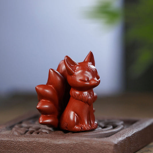 Handmade Yixing purple sand nine-tailed fox sculpture, a creative tea pet for tea table accessories.