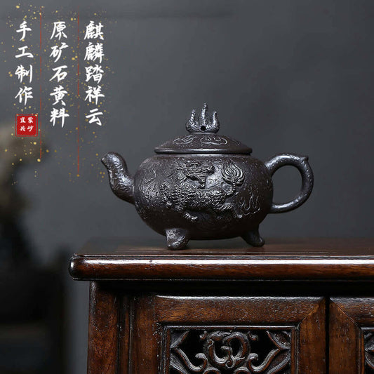 Handmade Yixing purple sand teapot with intricate Kirin design, perfect for kung fu tea sets and collectors.
