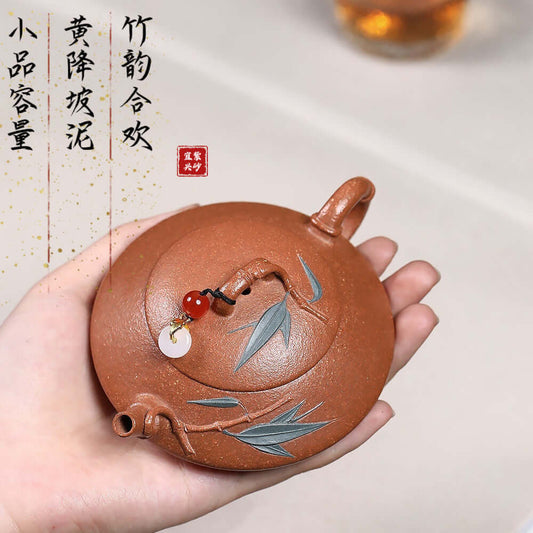 Handmade Yixing purple sand teapot featuring bamboo design, perfect for Kung Fu tea set dropshipping.