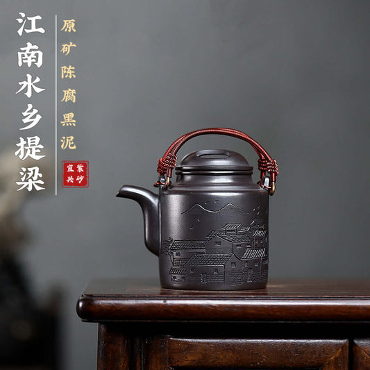 Handmade Yixing purple sand teapot with lifting beam and intricate design, perfect for home kung fu tea sets.