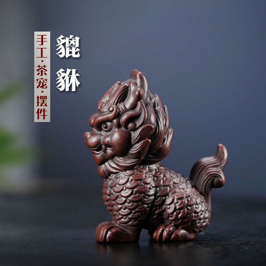 Handmade Yixing purple sand Kirin decoration for bedroom or porch, original craft by Yixing artisans.