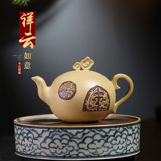 Handmade Yixing purple sand teapot styled with intricate designs, showcasing its unique craftsmanship and elegant shape.