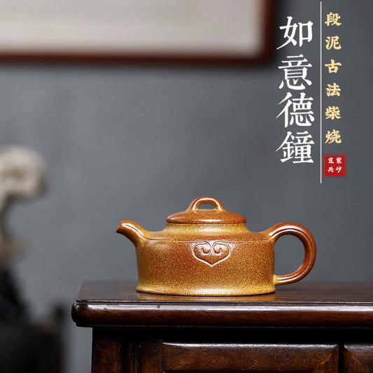 Handmade Yixing purple sand teapot, crafted from original purple clay using ancient firewood methods.