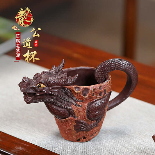 Handmade Yixing purple sand dragon cup with detailed craftsmanship, showcasing traditional Chinese culture in a unique tea accessory.