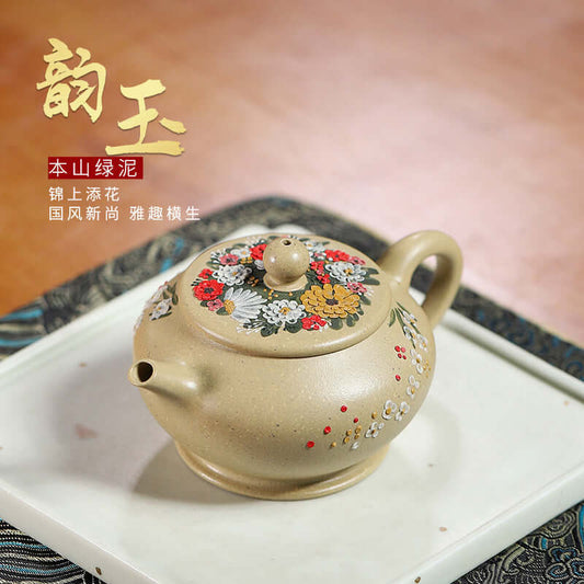 Handmade Yixing green mud teapot featuring floral design, showcasing craftsmanship in unique original purple sand.