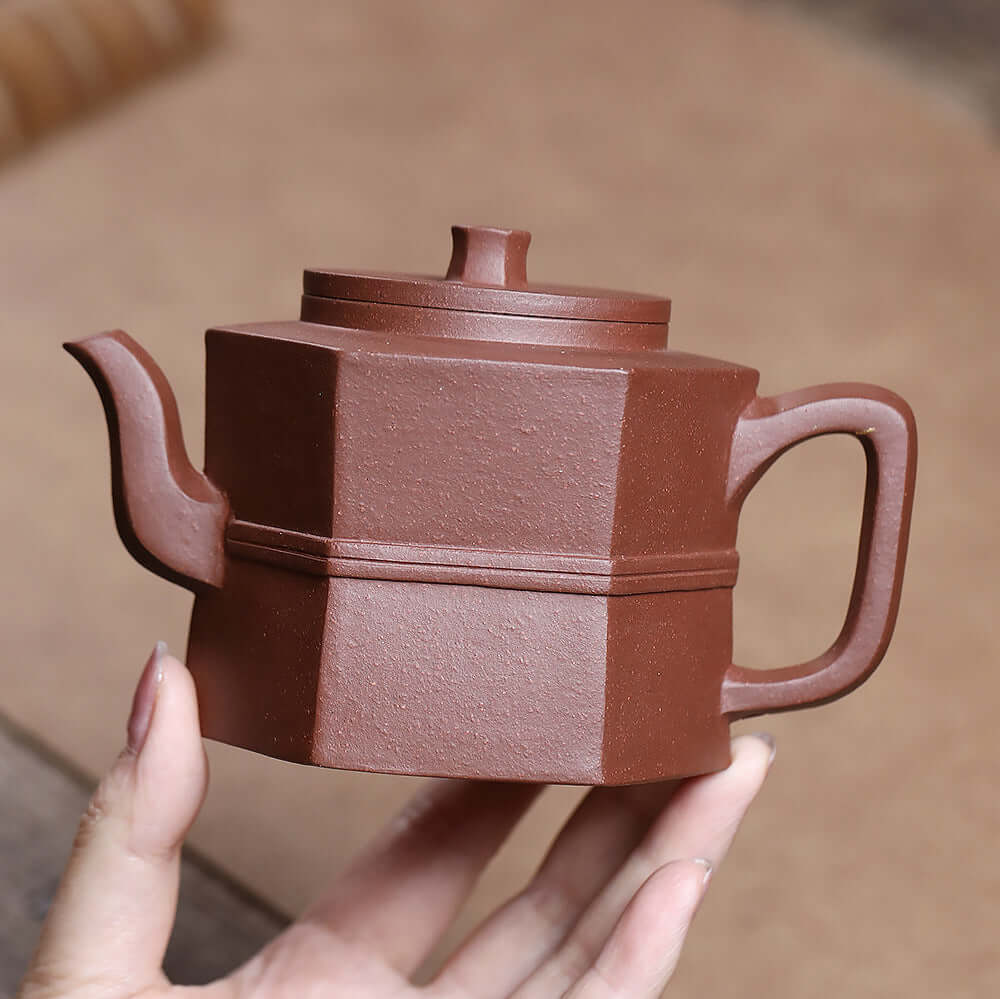 Handmade Yixing purple sand teapot, hexagonal design, original mineral clay, perfect for Kung Fu tea ceremonies.