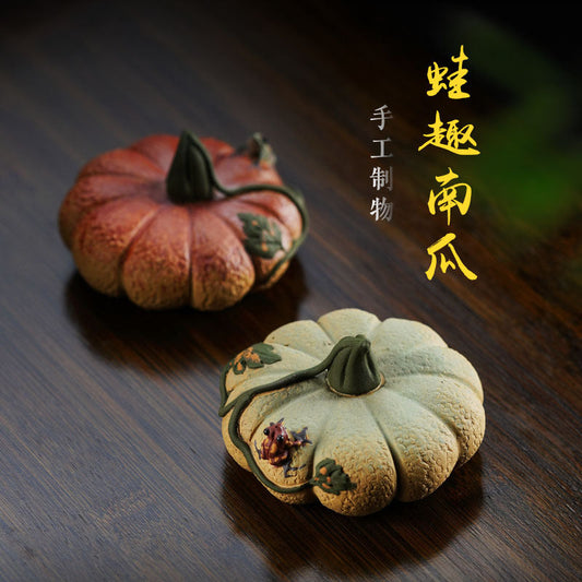 Handmade Yixing purple sand pumpkin tea pet ornament, featuring frog theme, ideal for tea sets and collectors.