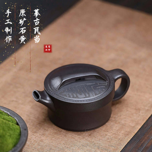 Handmade Yixing purple sand teapot with intricate design, ideal for Kung Fu tea, showcasing original craftsmanship.