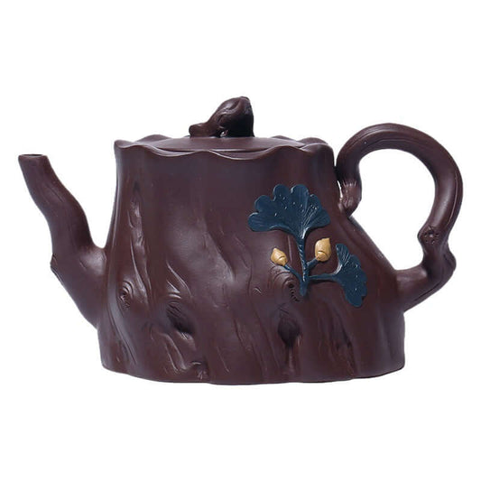 Handmade Yixing purple sand teapot designed as a ginkgo tree stump, featuring intricate details and a unique shape.