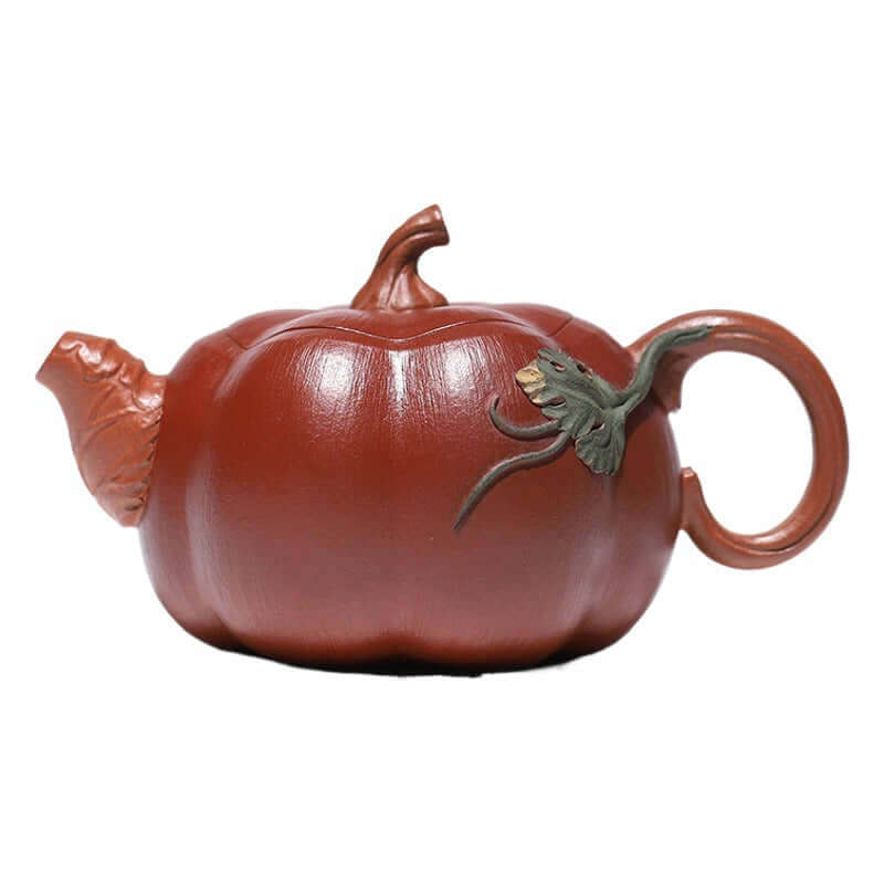 Handmade Yixing purple sand teapot shaped like a pumpkin with intricate details and a green handle.
