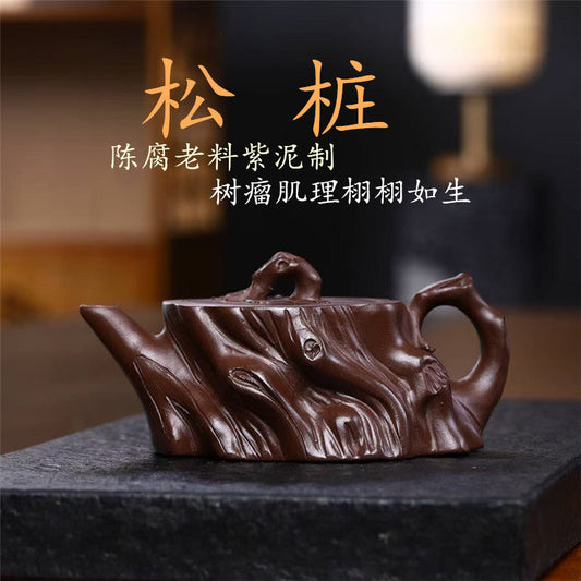 Handmade Yixing purple sand teapot with unique tree bark design, crafted by skilled artisans.