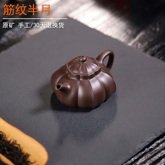 Handmade Yixing purple sand teapot with muscle纹 design, crafted by skilled artisans from original purple sand.