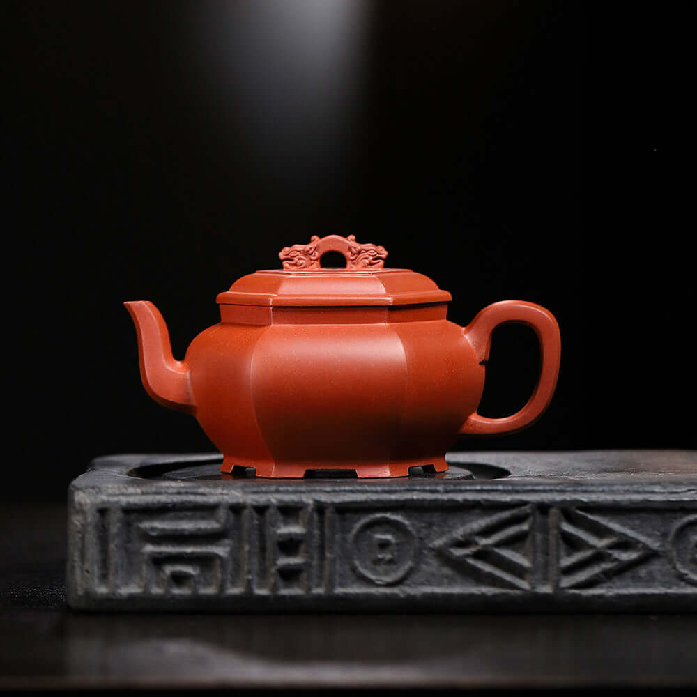 Handmade Yixing purple sand teapot on a decorative stand, showcasing high-end craftsmanship and original design.