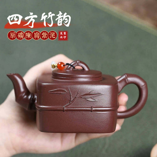 Handmade Yixing purple sand teapot featuring a square design, crafted by artisan, ideal for Kung Fu tea sets.