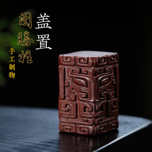 Handmade Yixing Zisha tea pet in embossed totem pattern, original purple sand tea set accessory, decorative and unique.
