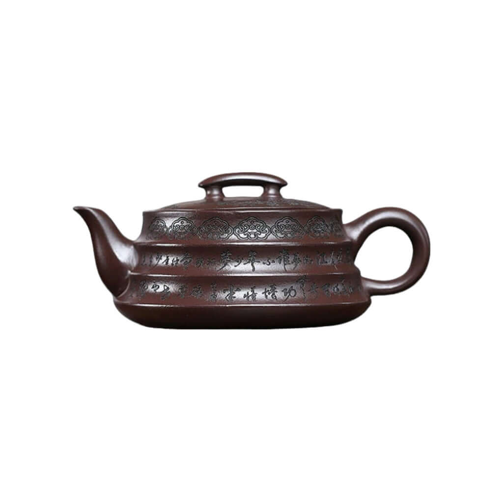 Handmade Yixing purple sand teapot with intricate designs, perfect for a traditional kung fu tea set.
