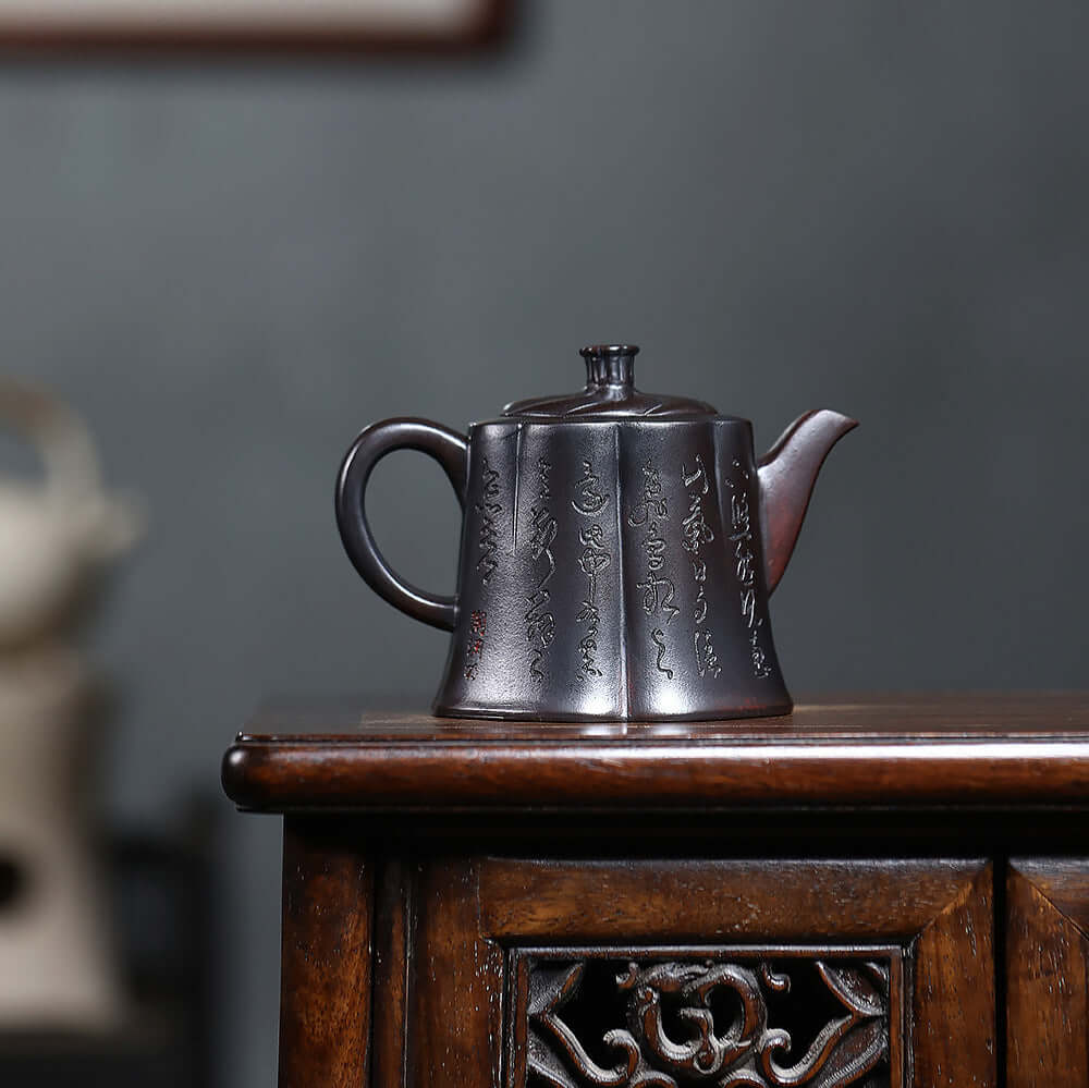 Handmade Yixing purple sand teapot with ancient cipher design, ideal for home kung fu tea set.