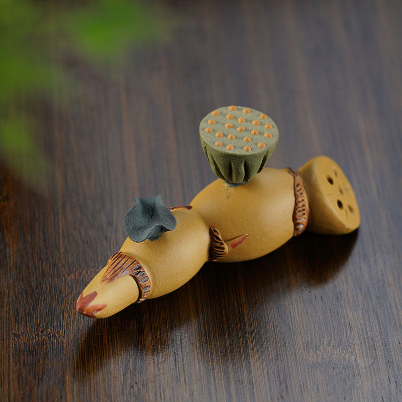 Handmade Yixing purple sand lotus root tea pet decoration for tea sets, showcasing intricate craftsmanship and design.