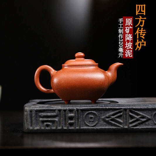 Handmade Yixing purple sand teapot on a display stand, showcasing authentic craftsmanship and unique design.