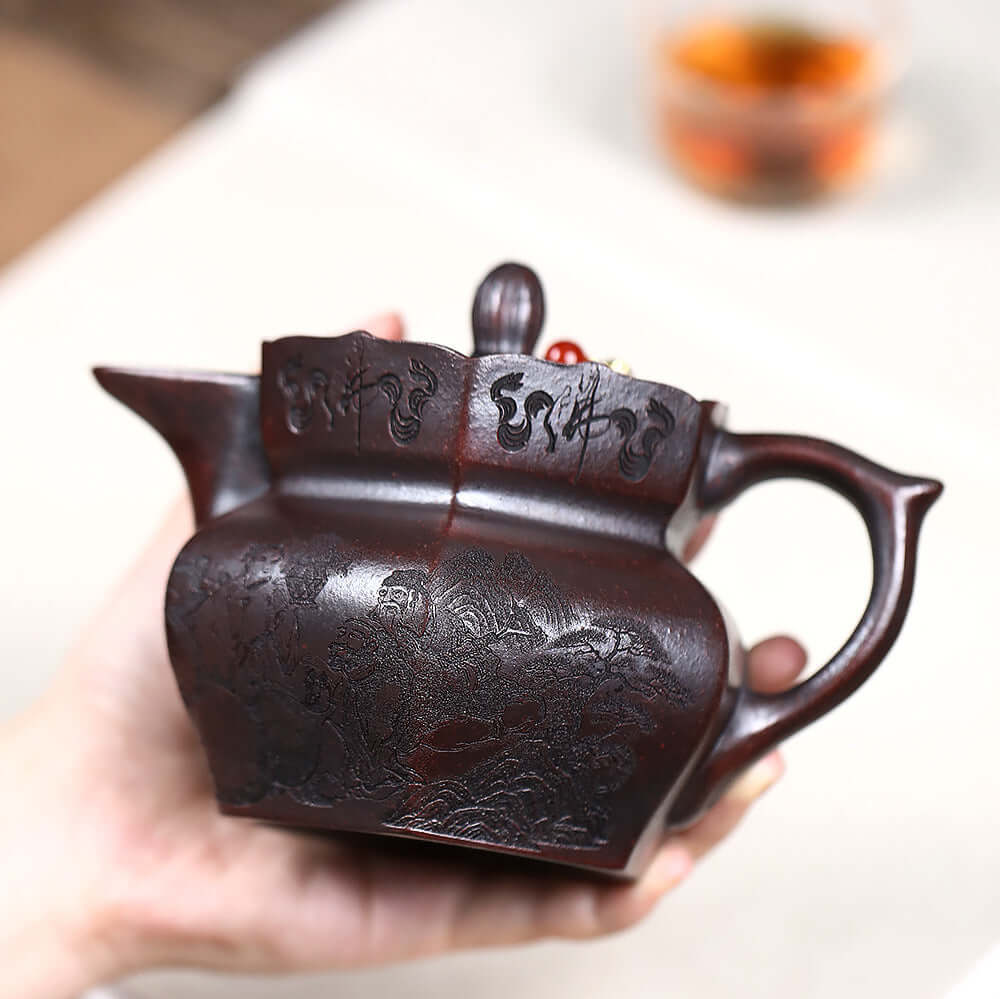 Handmade Yixing purple sand teapot with intricate designs, perfect for Kung Fu tea sets and dropshipping.