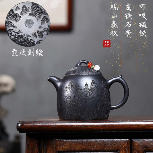 Handmade Yixing purple sand teapot with intricate mountain design, perfect for Kung Fu tea sets.