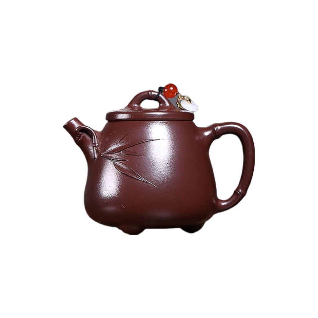 Handmade Yixing purple sand teapot with bamboo design, perfect for Kung Fu tea sets and home use.