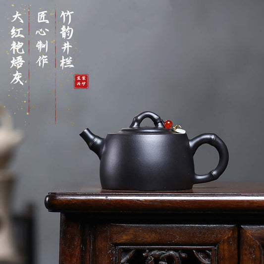 Handmade Yixing purple sand teapot, Da Hong Pao with bamboo pattern, perfect for Kung Fu tea rituals.