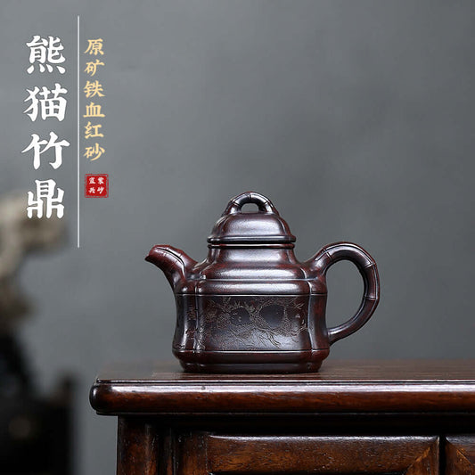 Handmade Yixing purple sand teapot with iron red sand finish, perfect for kung fu tea sets, crafted by Yixing artisans.