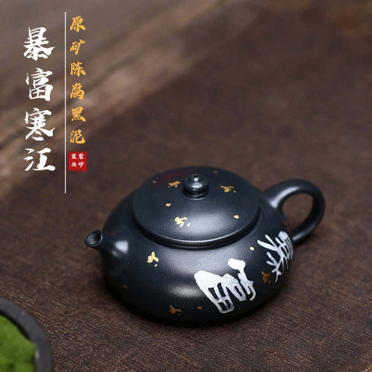 Handmade Yixing purple sand teapot in raw ore black mud, ideal for kung fu tea set, crafted by Yixing artisans.