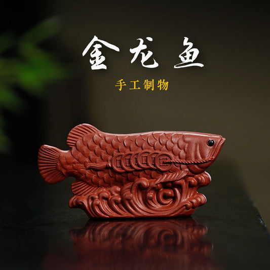 Handmade Yixing purple sand dragon fish tea pet ornament, perfect for tea lovers and collectors.