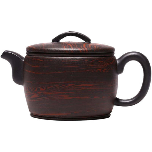 Handmade Yixing purple sand teapot with traditional design, featuring a dark red and black pattern, perfect for tea lovers.