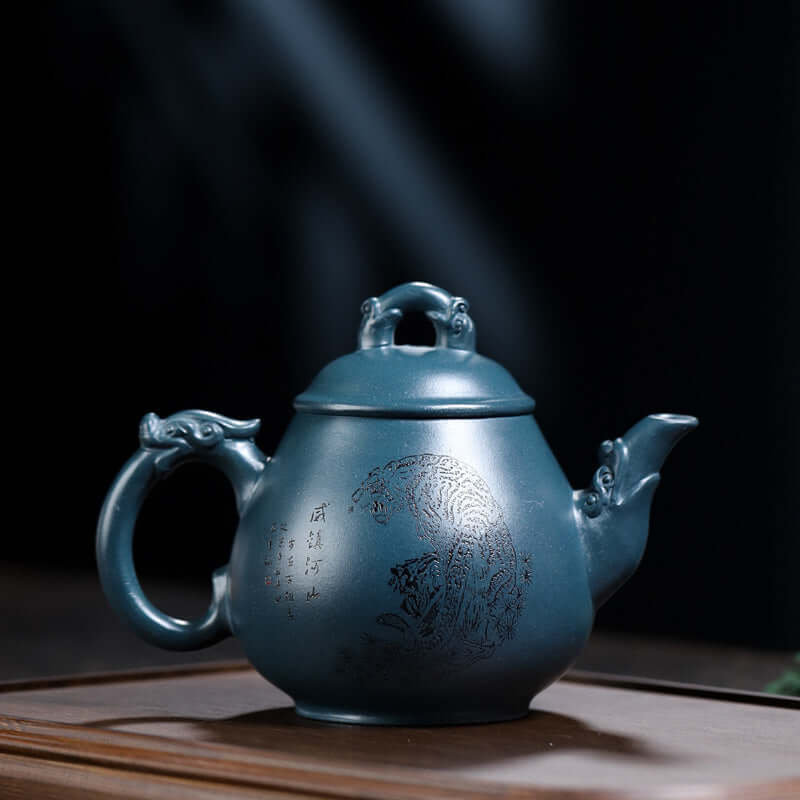 Handmade Yixing purple sand teapot featuring intricate design, ideal for tea brewing, showcasing natural elegance and craftsmanship.