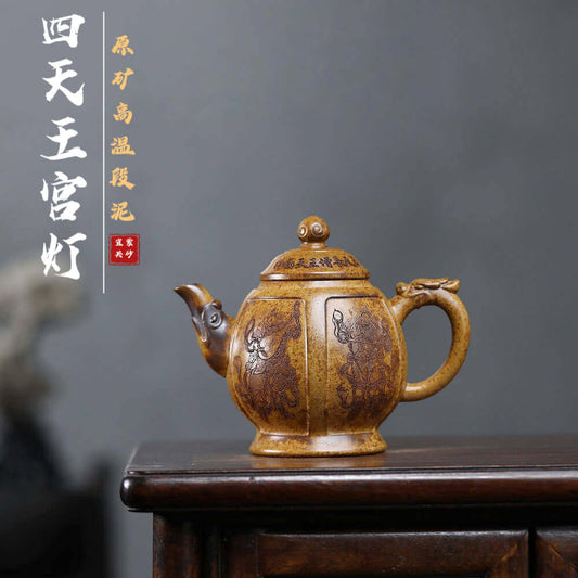 Handmade Yixing purple sand teapot featuring intricate designs, perfect for kung fu tea sets and artful home decor.
