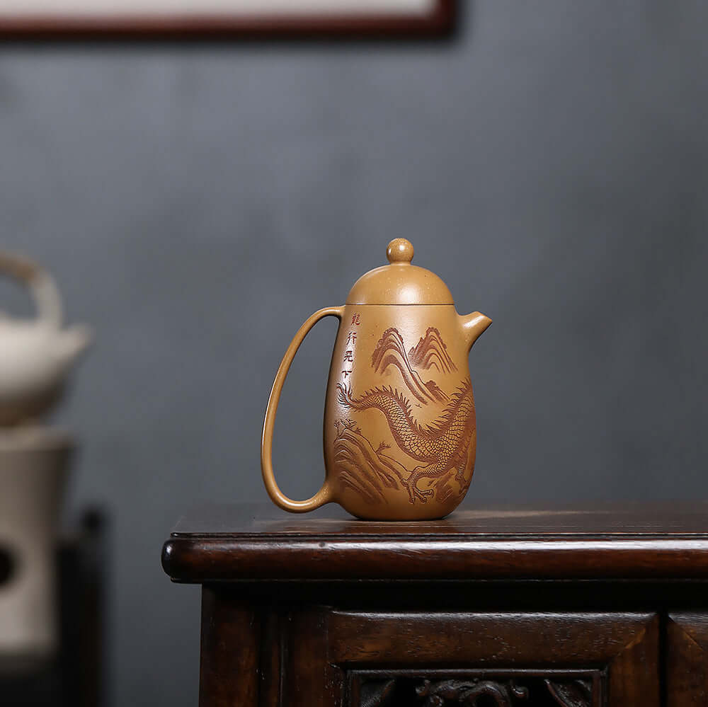 Handmade Yixing purple sand teapot with dragon design, original clay, perfect for kung fu tea ceremonies.