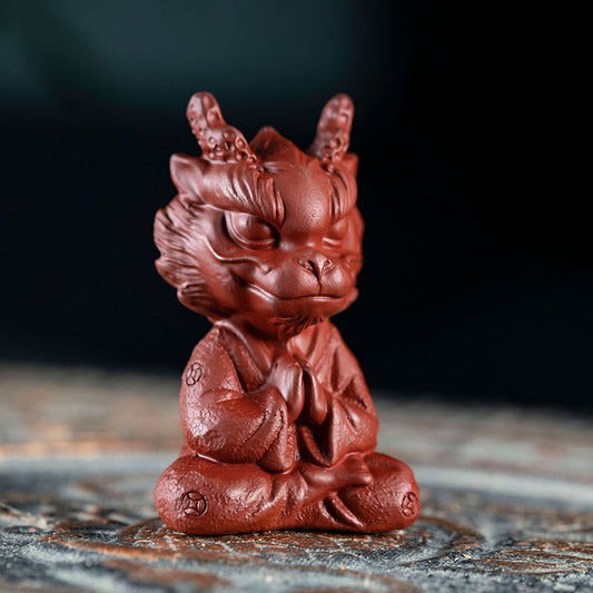 Handmade Yixing purple sand tea pet little dragon man ornament, ideal for tea sets and unique gifts.