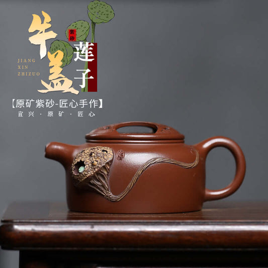 Handmade Yixing purple sand teapot with frog and lotus seed design, perfect for home kung fu tea sets.