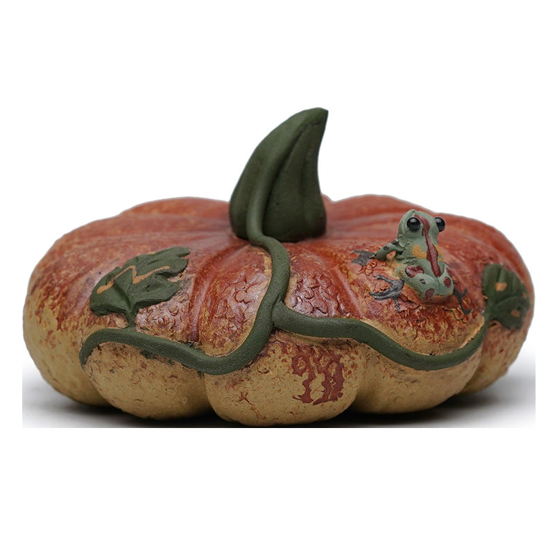Handmade Yixing purple sand pumpkin tea pet ornament with frog, perfect for tea sets and decoration.