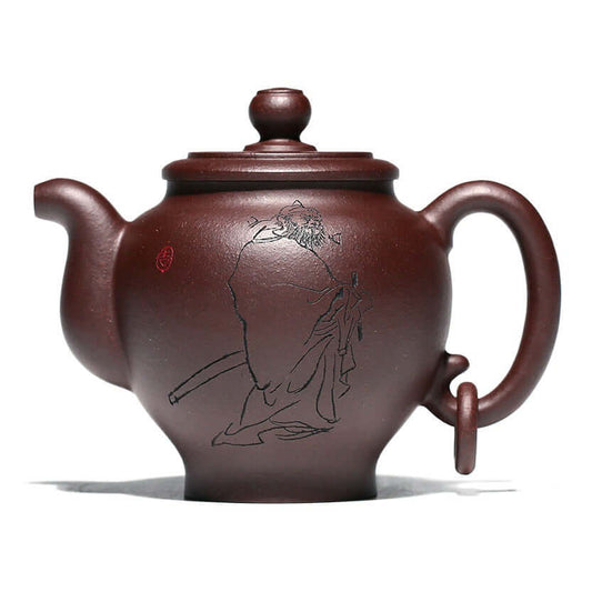 Handmade Yixing purple sand teapot with engraved character design, elegant craftsmanship for Kung Fu tea sets.