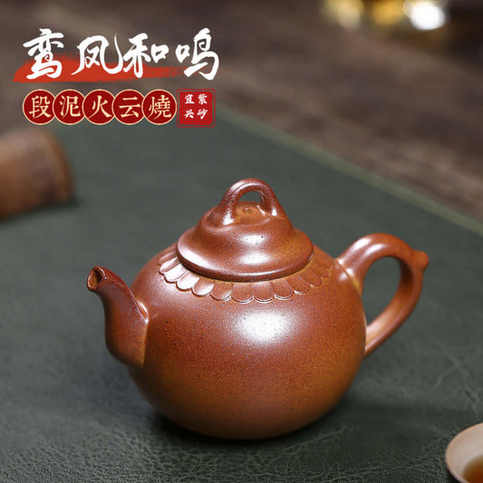 Handmade Yixing purple sand teapot showcasing unique design and craftsmanship, ideal for kung fu tea sets.
