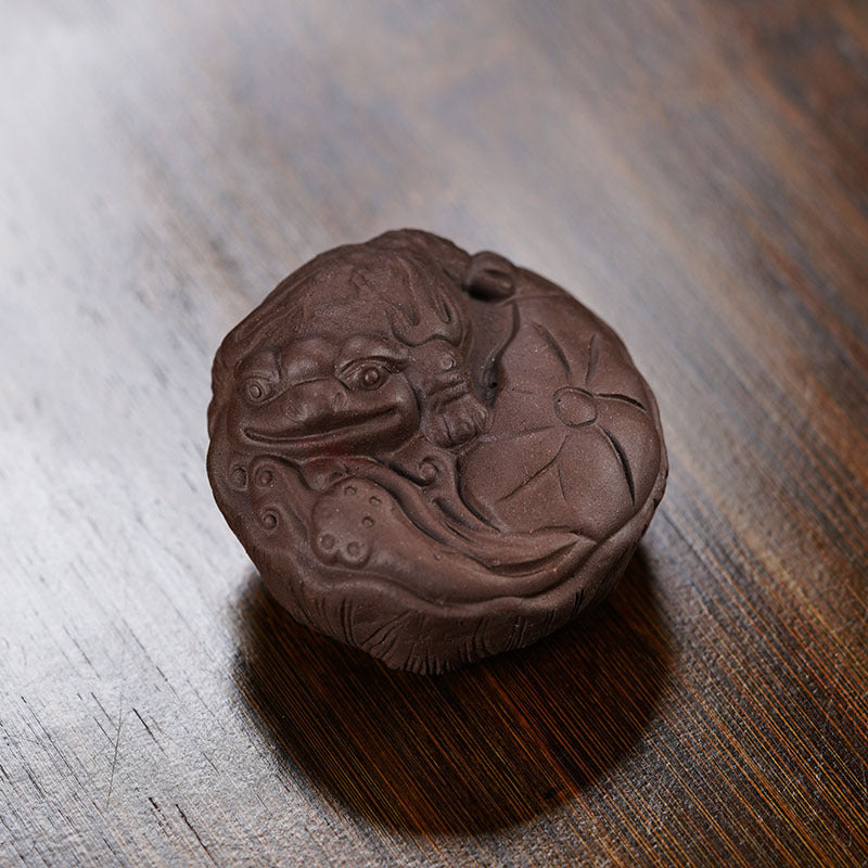 Handmade Yixing purple sand frog sculpture, unique tea pet ornament for tea lovers and creative gift.